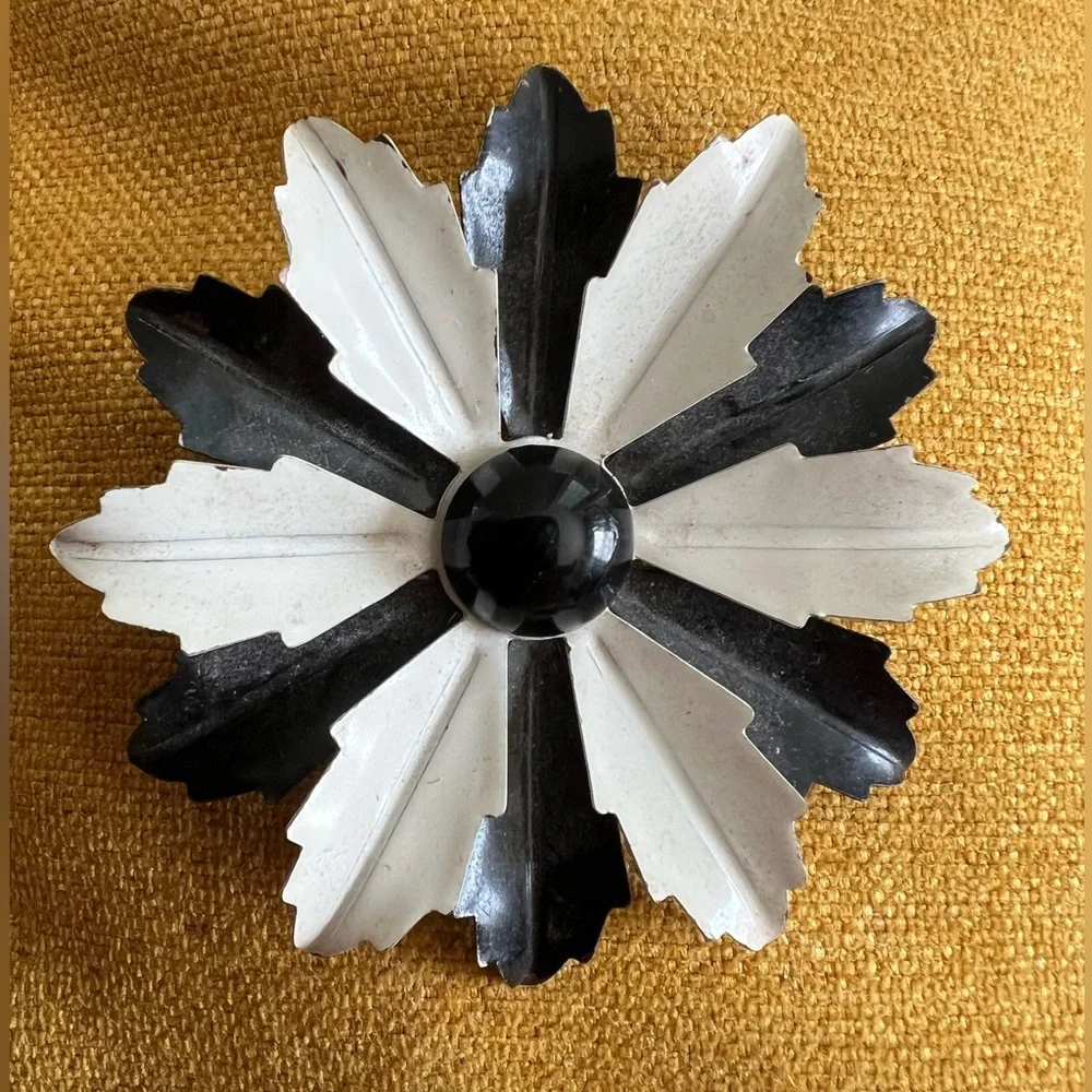 Vintage floral brooch black&white enamel petals and solid black center.
